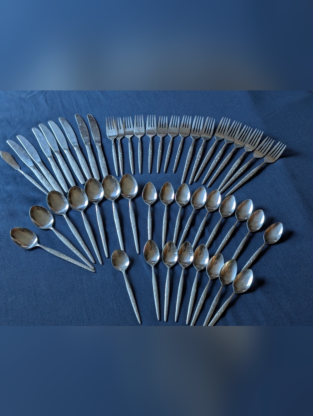 Vintage National Steel Nesco Fleur Flatware Set includes 49 pieces